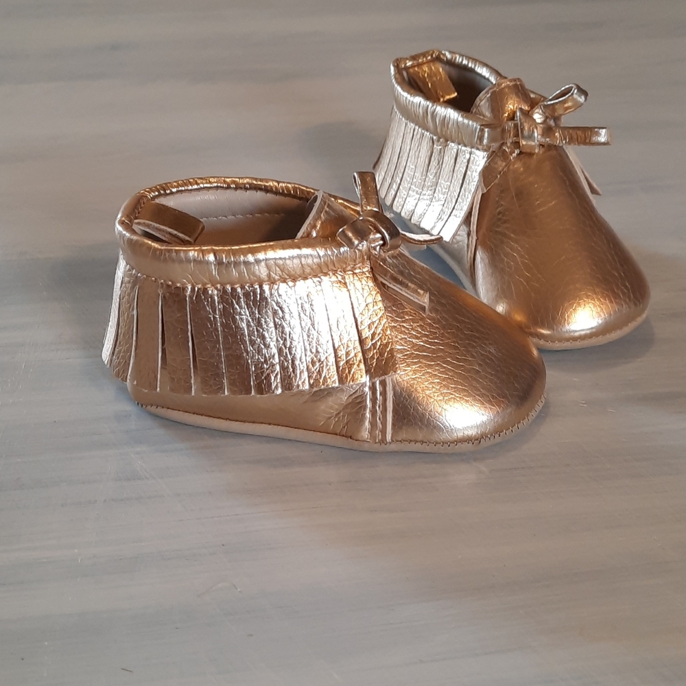 Baby gold moccasins